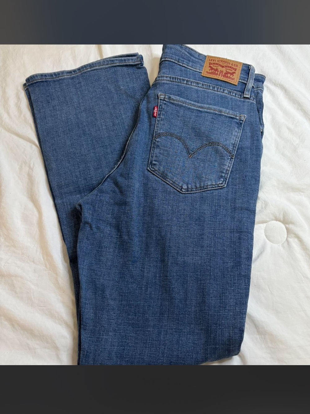 Levi's Women's 725 Boot Cut Jeans in Medium Blue Denim